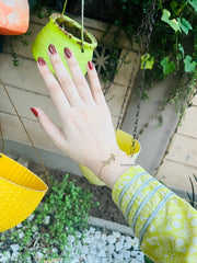 YSL Opyum Charm Bracelet.